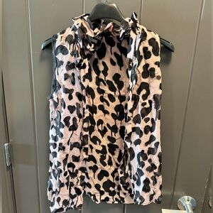 Sleeveless too by Moschino